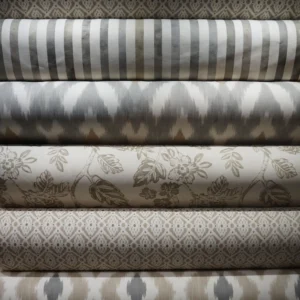 Vista de telas de la coleccion Lino Esmerilado con variedad de estampados y tonalidades suaves.